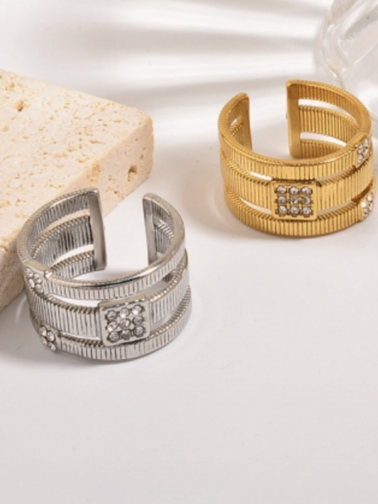 Three Wide Band Zircon Rings